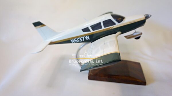 Model of Piper PA-28 Cherokee with detailed craftsmanship.